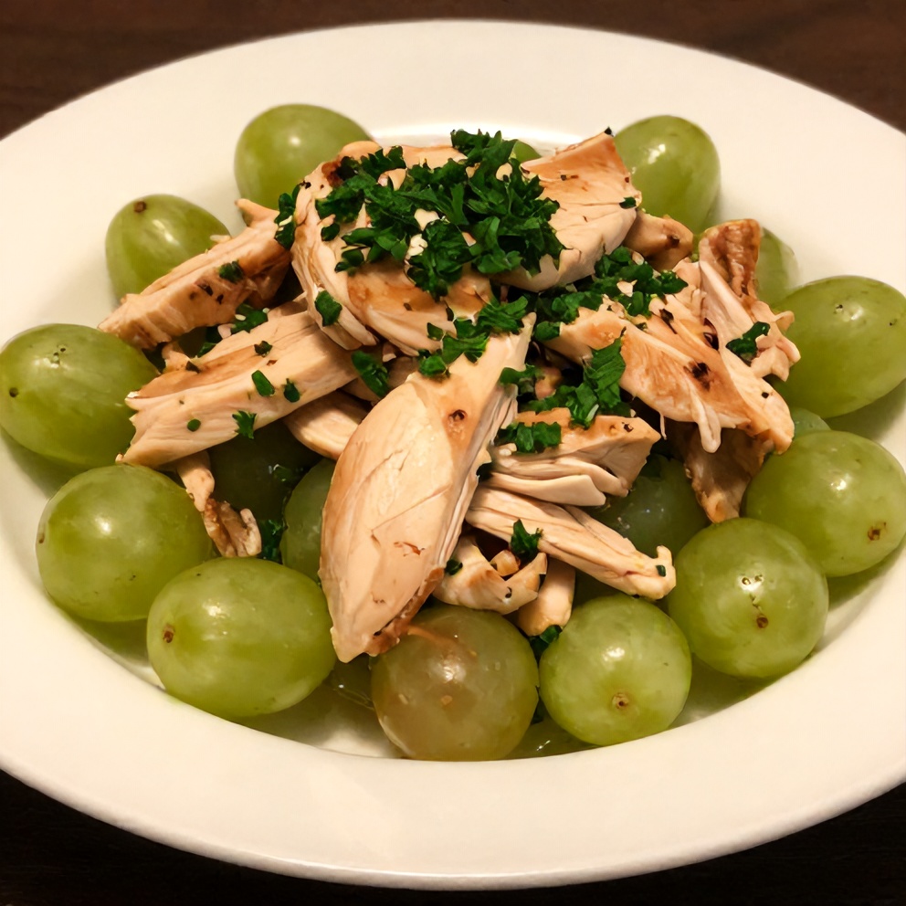 Plated chicken grape salad with fresh parsley garnish