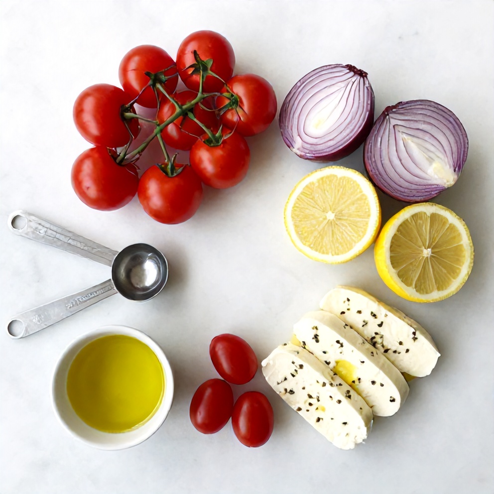 Raw ingredients for Halloumi Skewers on a marble surface