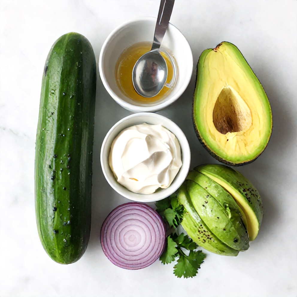 Raw ingredients for cucumber avocado salad